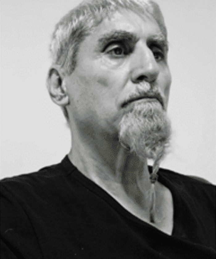 Black and white portrait of an older bearded man